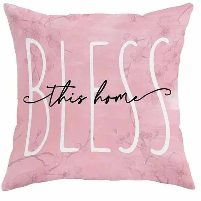 Short velvet cushion cover with cherry blossom letter print, 45cm square, shown in one of four colours.