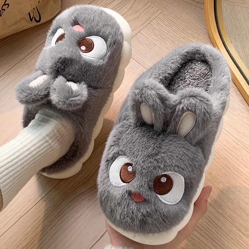 Female cartoon ankle wrap thermal cotton slippers in pink, blue, and gray options with suede upper and non-slip PVC sole