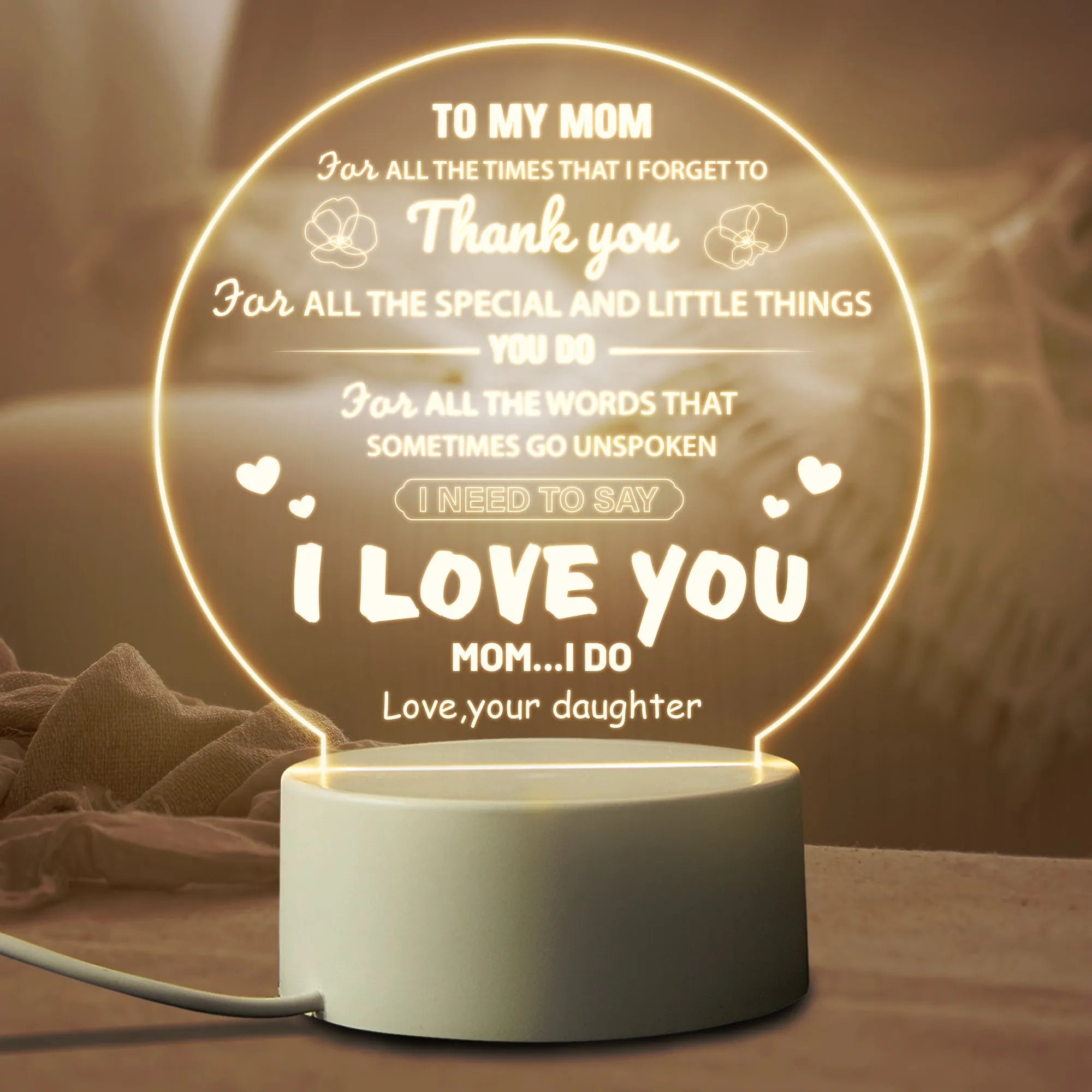 Modern white bedside night light with acrylic shade on ABS base, connected via USB cable.