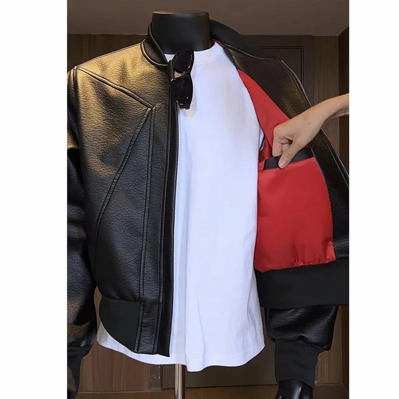 Men's black PU leather jacket with litchi texture and extended 100cm length in slim fit.