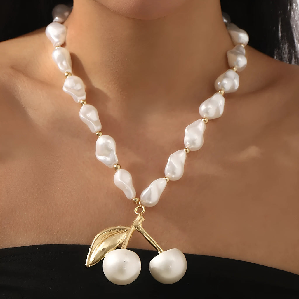 Women's geometric cherry fruit pendant necklace with pearl chain in gold or white K electroplated finish