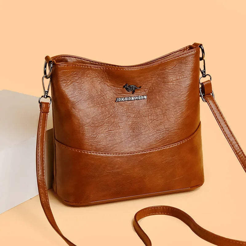 Women's large capacity soft leather shoulder bag in bucket style with sandwich pocket