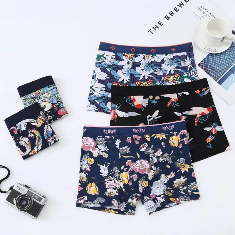 Men's cotton boxer shorts with floral print, showing mid-waist fit and U-shaped convex design.