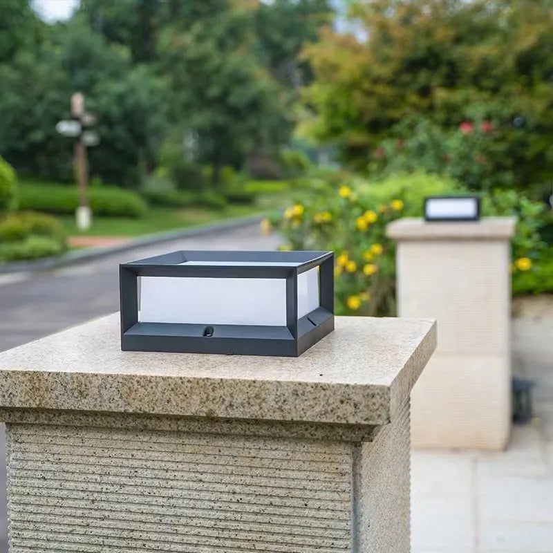 Aluminium outdoor solar column light mounted on a wall, shown in two available sizes.
