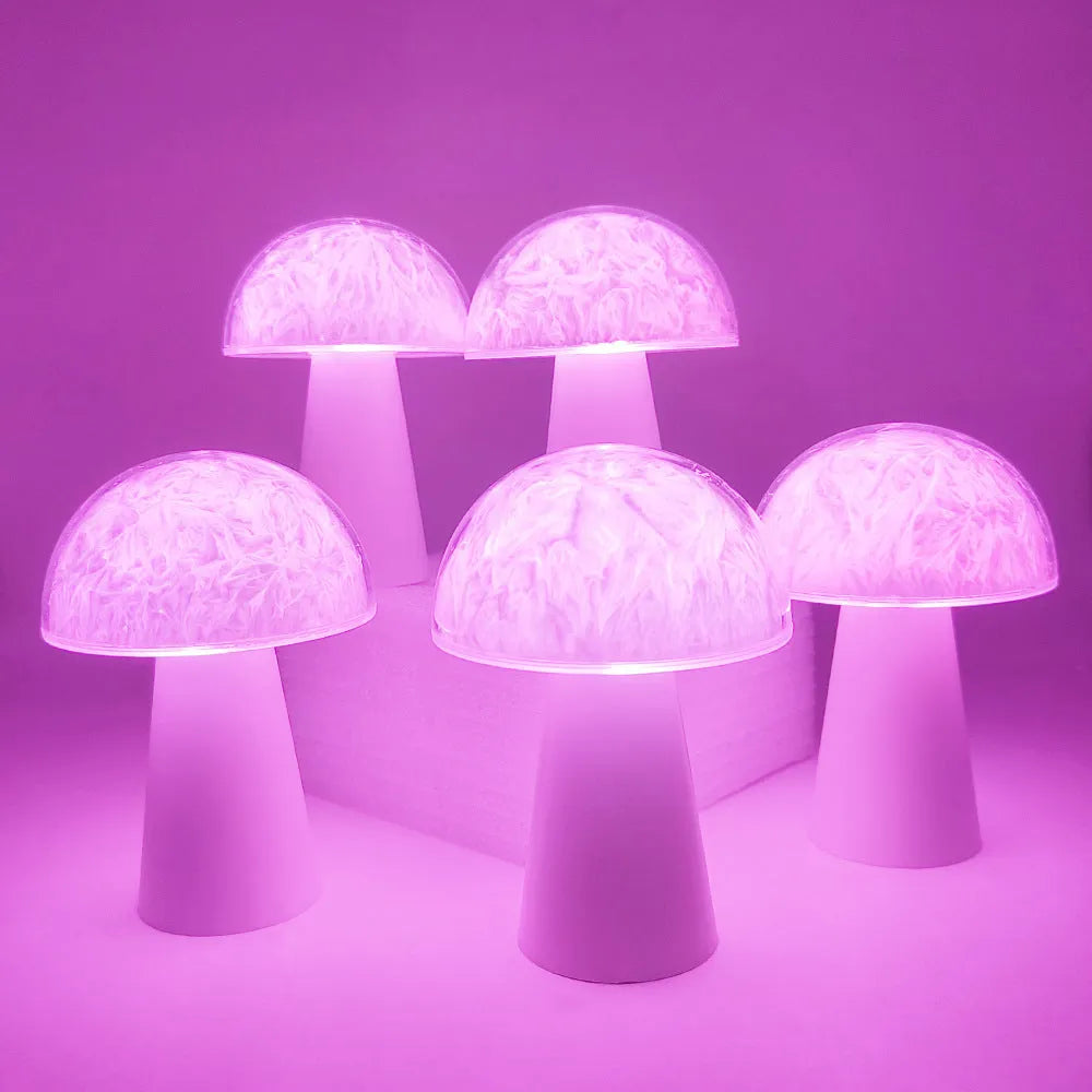 Small white mushroom-shaped decorative night light with RGB colours, remote control, on a wooden table.