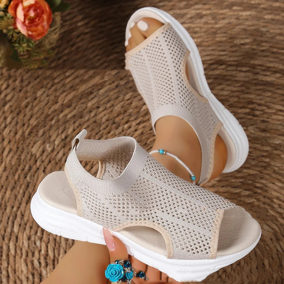 Women's black platform sports sandals with a flat toe and mesh lining on a rubber sole.