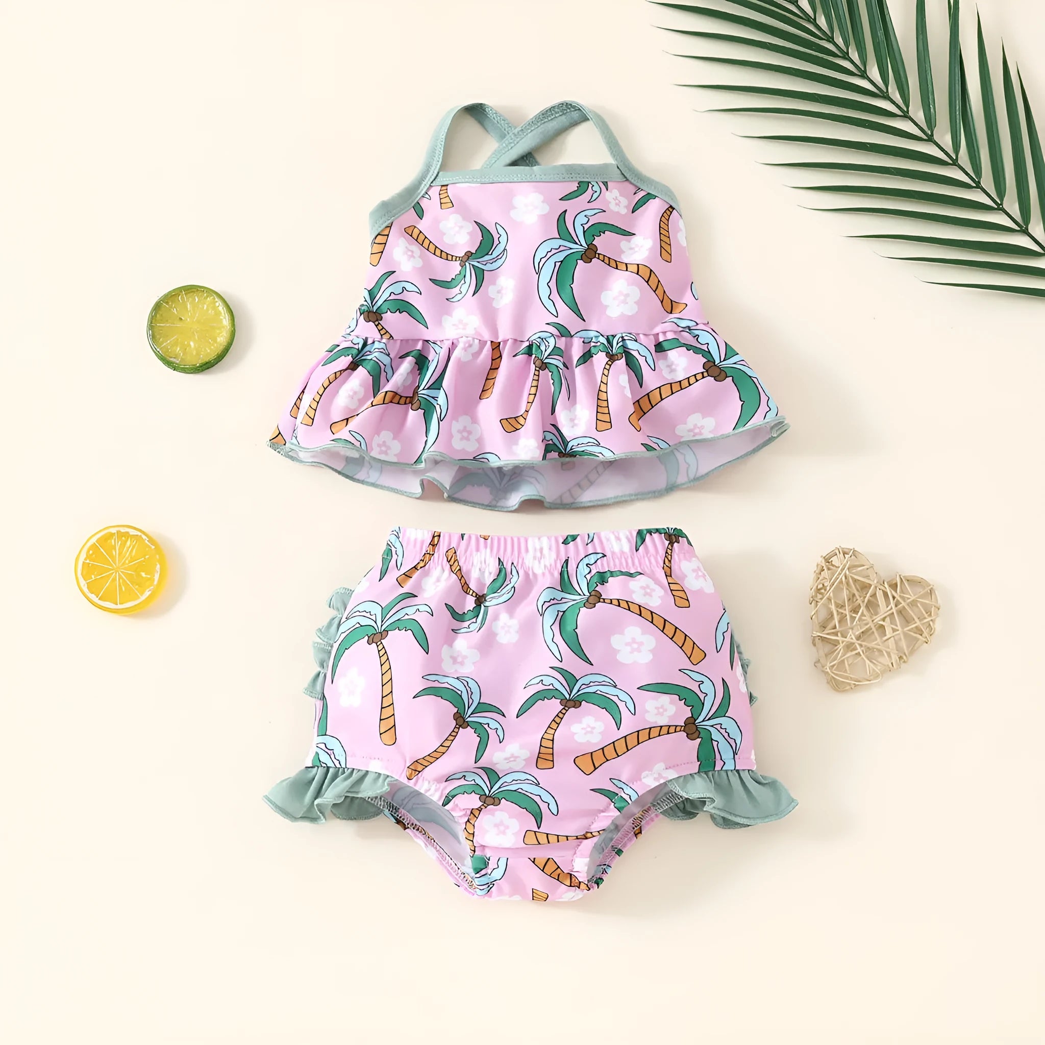 White sweet style children's two-piece swimsuit set with top and shorts on a hanger