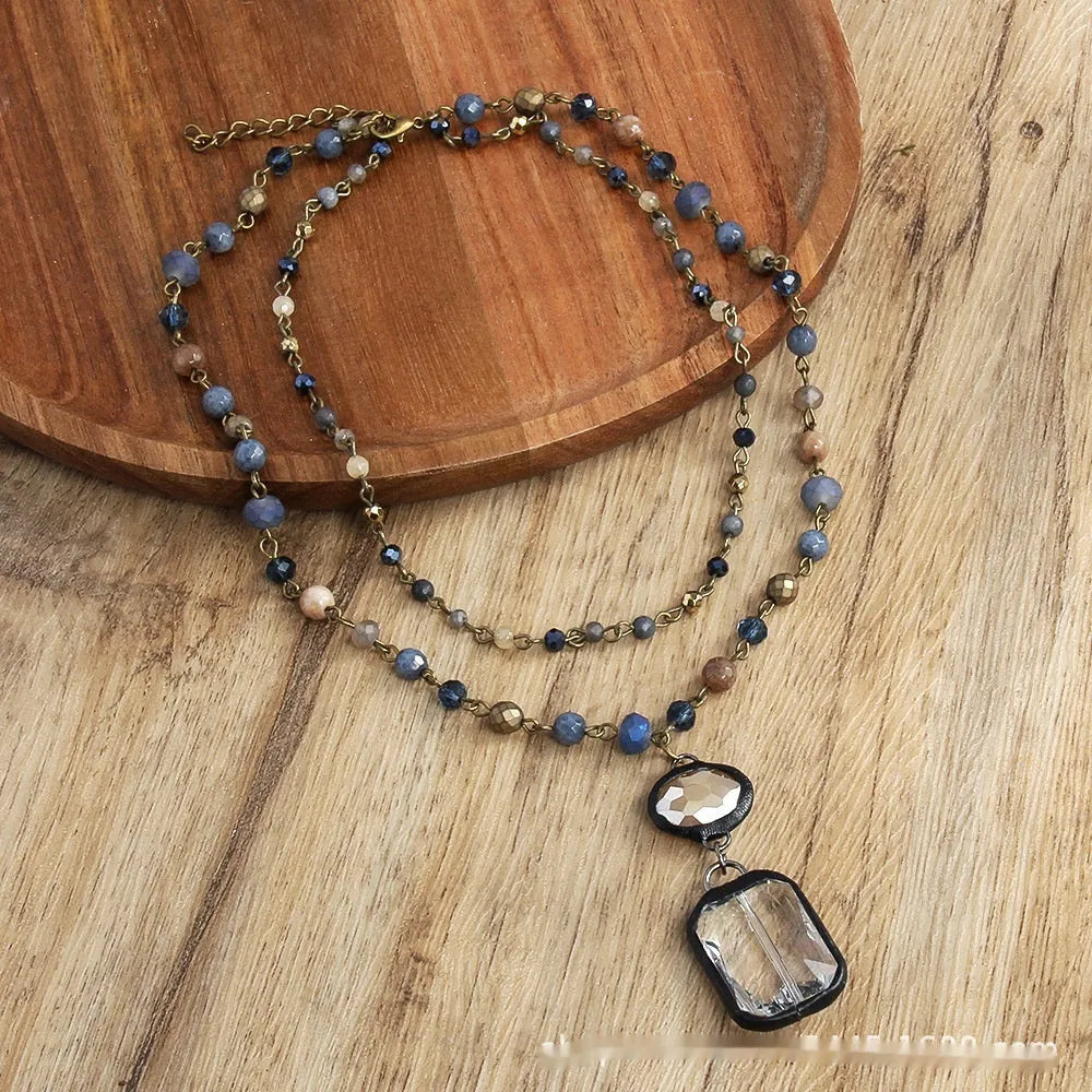 Retro tribal style 2-layer necklace with natural stone and glass pendants in beige or blue colour
