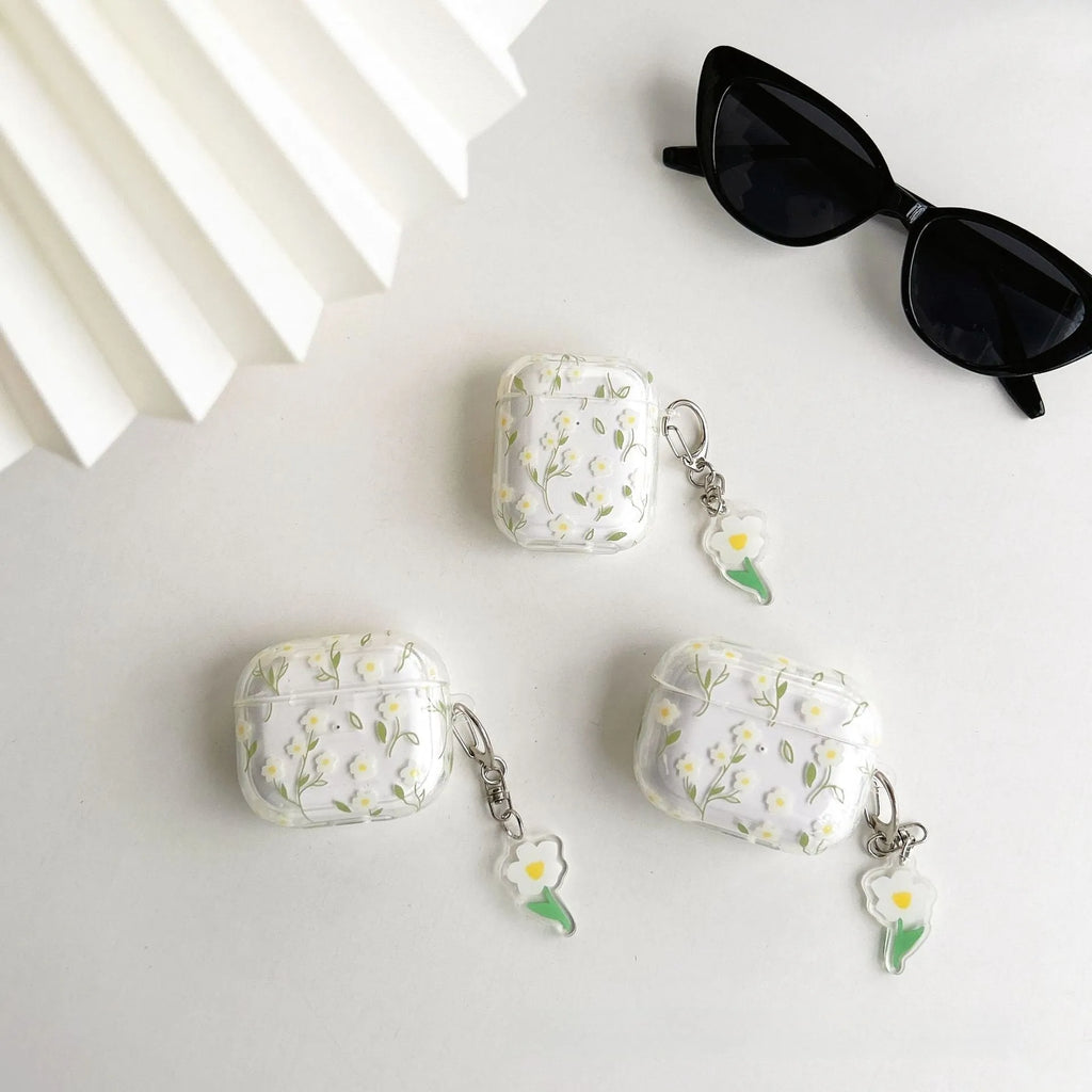 Clear soft TPU protective case for Apple AirPods with white floral oil painting decoration.