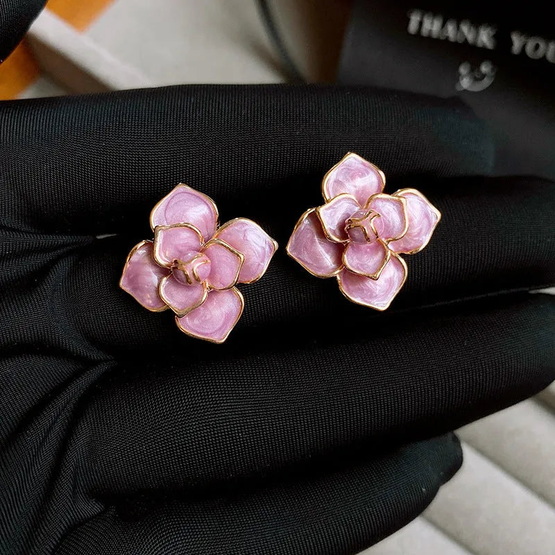 Purple oil-spot glaze gold-plated copper flower stud earrings with silver needle detail