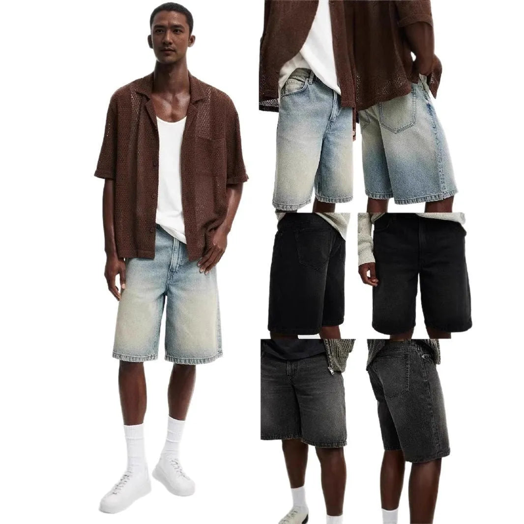 Men's loose straight leg jeans in light blue denim on a plain background