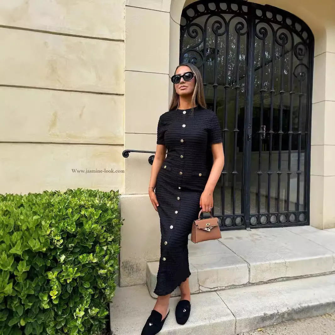 French retro slim fit knitted long-sleeved dress in black, featuring button front and mid waist.