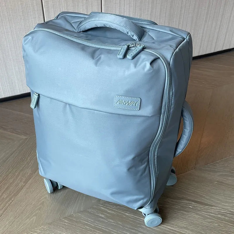 Ultra-light waterproof Oxford cloth suitcase with universal wheels in contemporary colour options