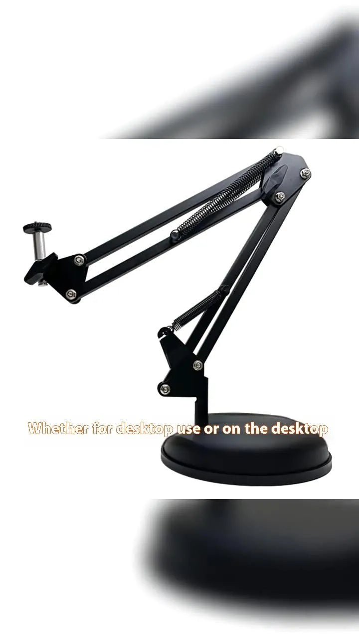 Black foldable metal cantilever bracket holding a tablet, extended on a desktop.