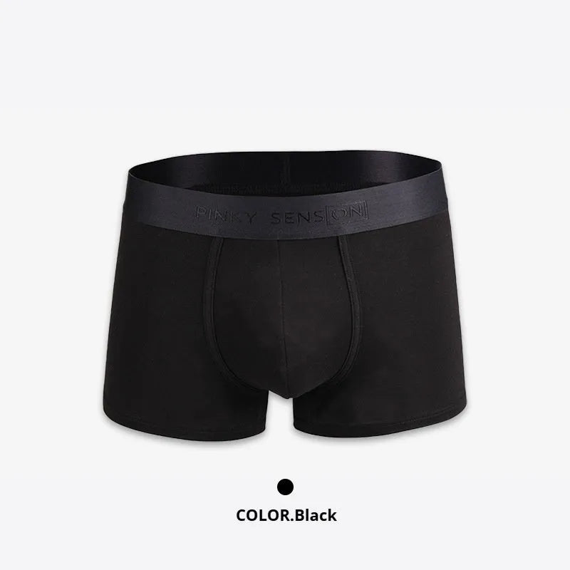 Men's solid colour cotton boxer shorts in black, white, silver grey, and light green.