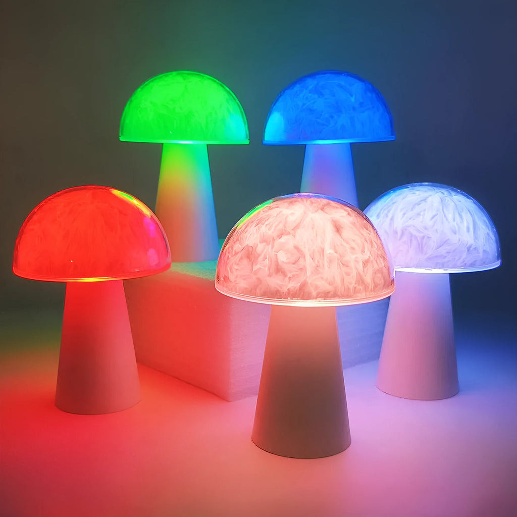 Small white mushroom-shaped decorative night light with RGB colours, remote control, on a wooden table.