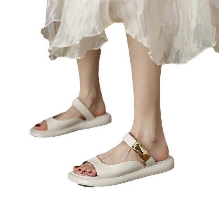 Women's apricot peep toe flat platform sandals made of soft leather with a rubber sole.