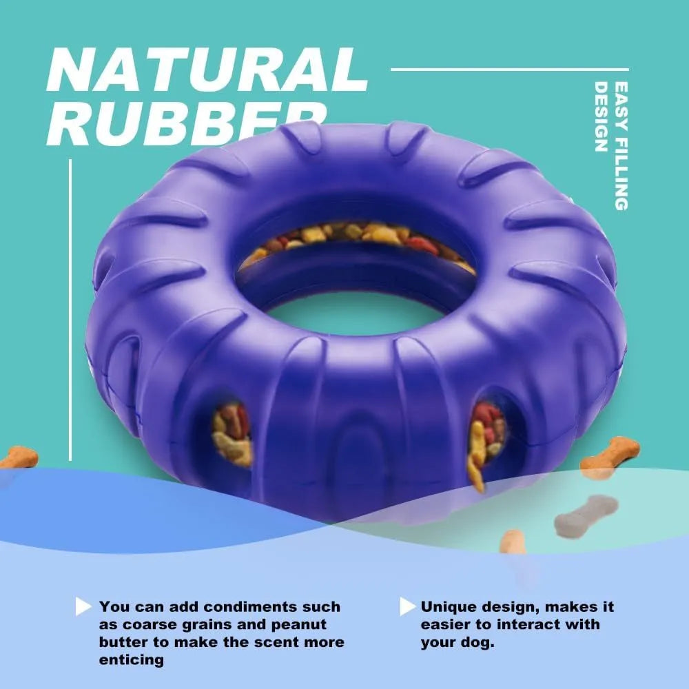 Blue, green, and red tyre-shaped dog chew toy with oval openings, a slow feeder and treat dispenser.