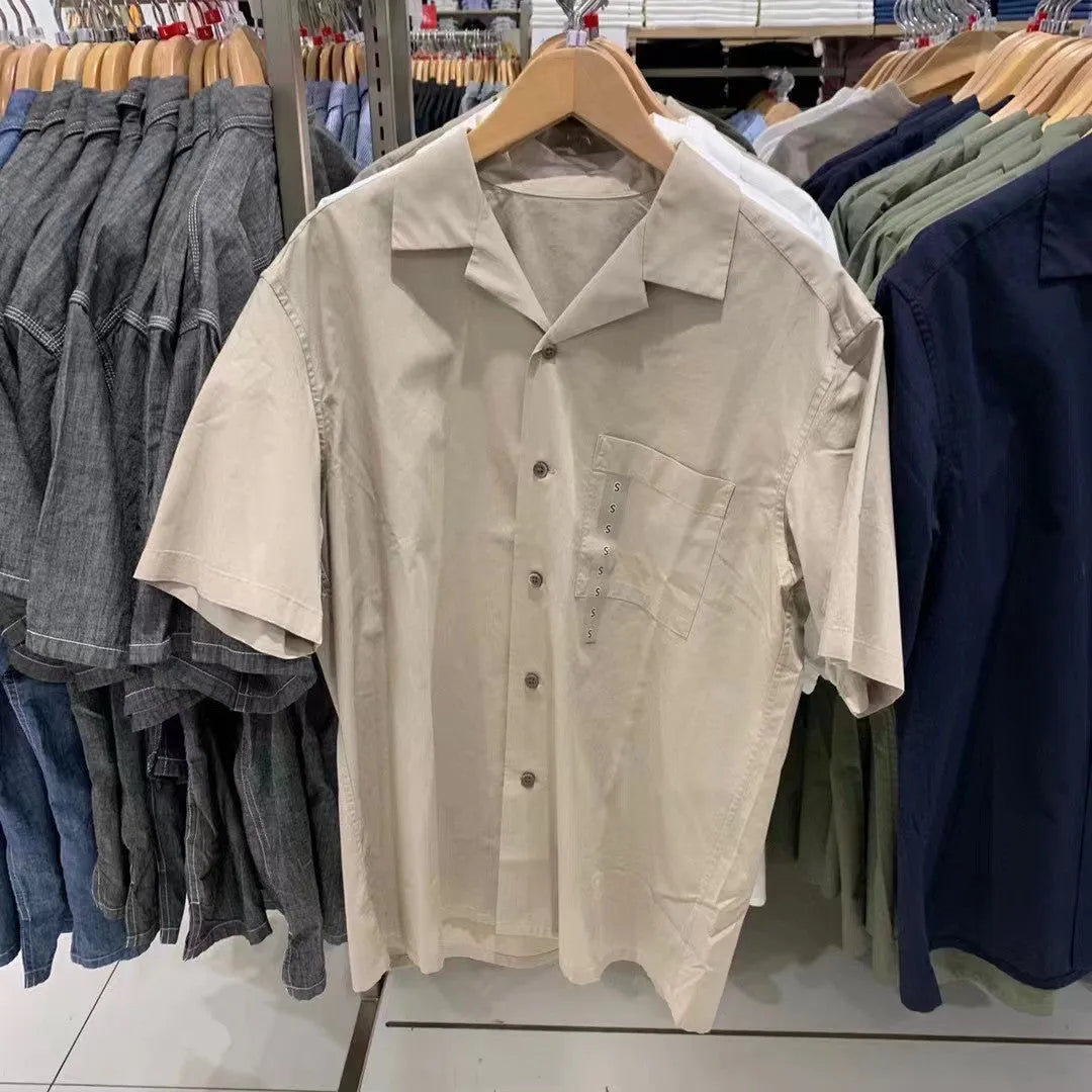 Men's beige modal cotton open collar casual shirt with regular sleeves on a hanger