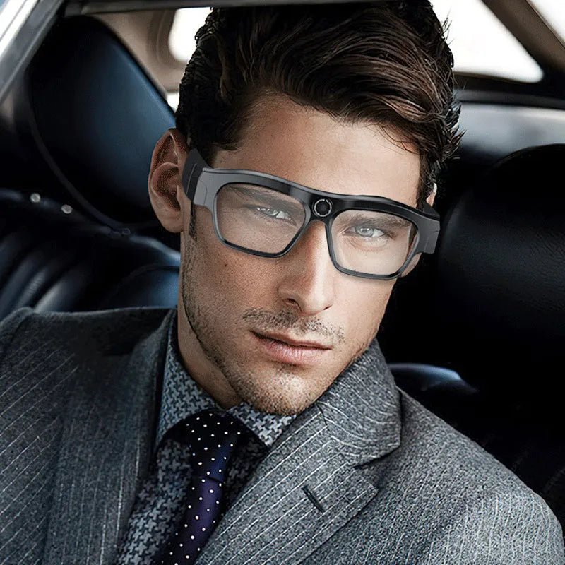 Black head-mounted smart Bluetooth glasses with transparent lens and camera for video recording