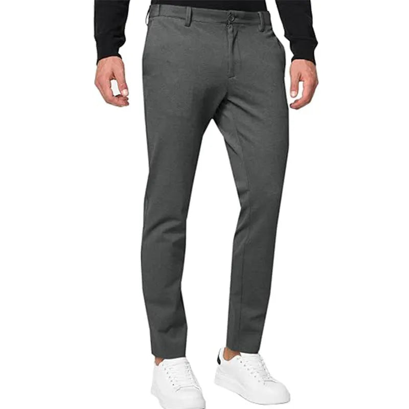 Men's slim-fit tapered chino trousers in solid colours with mid-waist and zipper fly