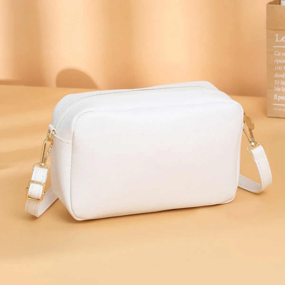 Women's solid colour PU leather shoulder bag with three-dimensional pockets in five colour options