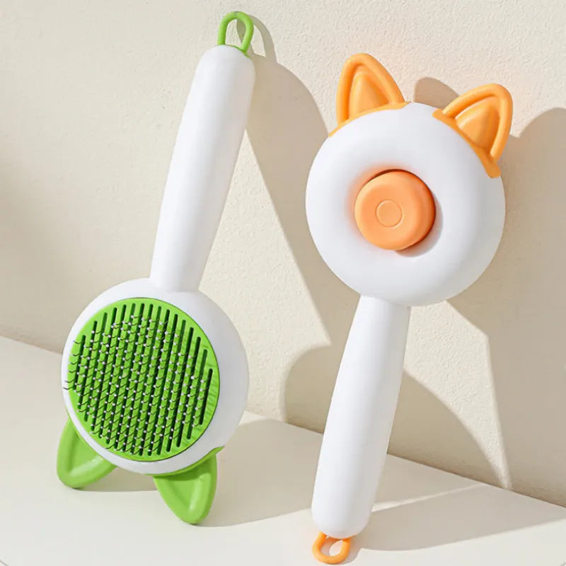 Self-cleaning pet hair remover comb for cats and dogs in greenish white and orange white