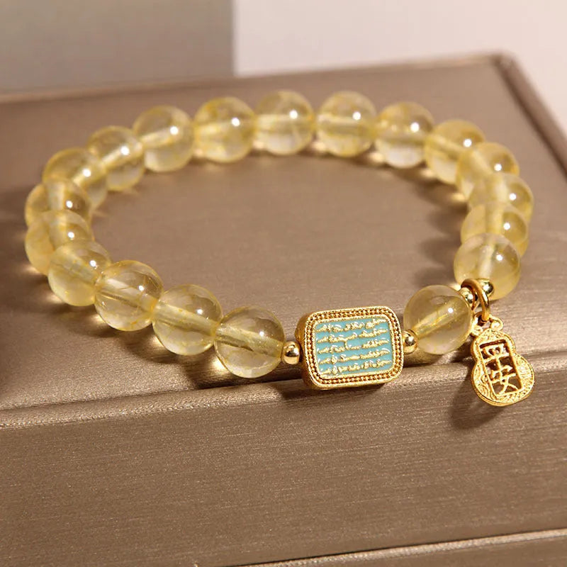 Women's yellow citrine crystal bracelet with rhinestones on adjustable 7-inch band