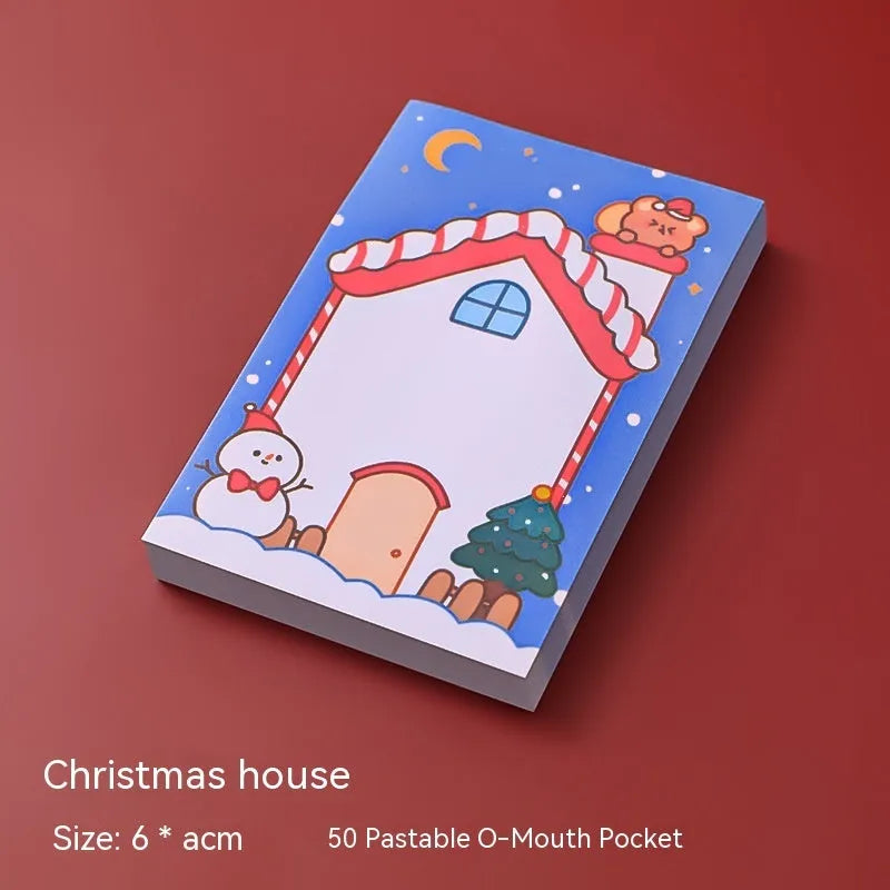 Christmas sticky notes pad showing eight festive designs including Santa Claus, elf, snowman, and gift box