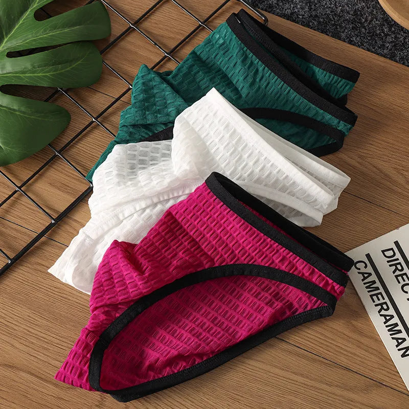 Men's low waist transparent visual underwear in nylon lace fabric showing breathable quick-drying construction