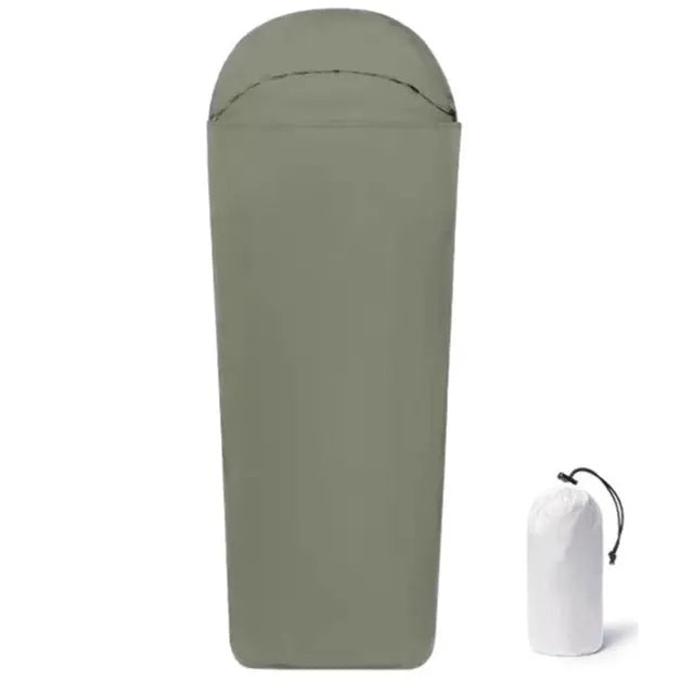 Blue mummy-type camping sleeping bag with nylon fabric shown packed and unpacked
