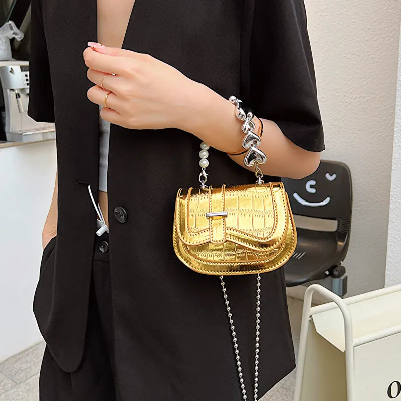 Women's silver PU leather mini tote saddle crossbody bag with single strap and outer pocket