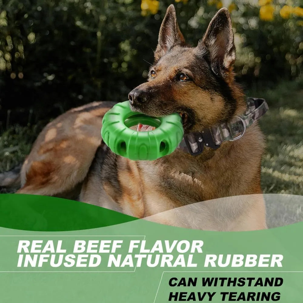 Blue, green, and red tyre-shaped dog chew toy with oval openings, a slow feeder and treat dispenser.