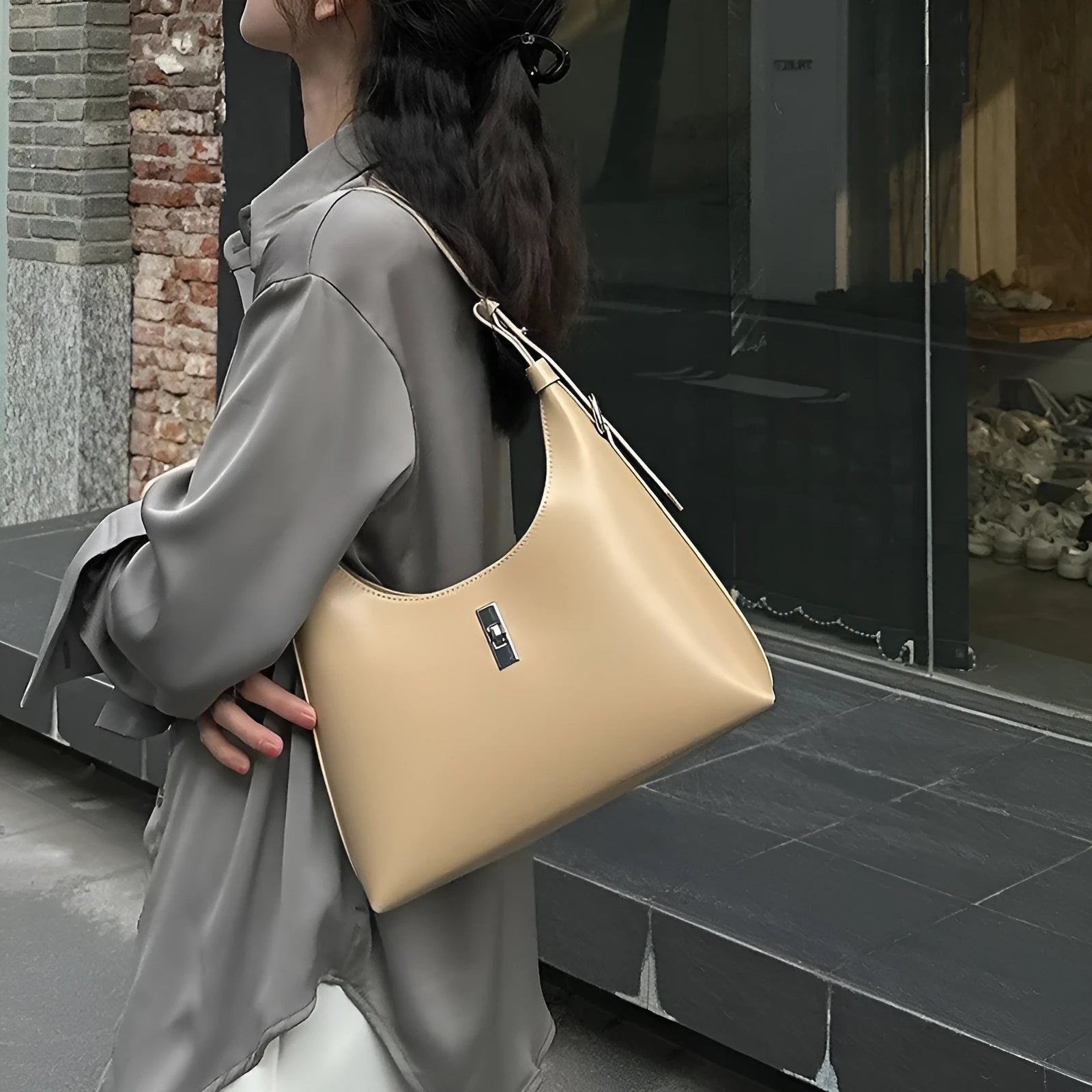 Genuine leather crossbody shoulder bag in dumpling shape with external sandwich pocket