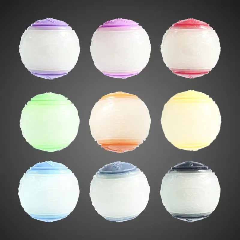 TPR rubber dog toy ball in two-tone colours with sound-making function for chewing and training