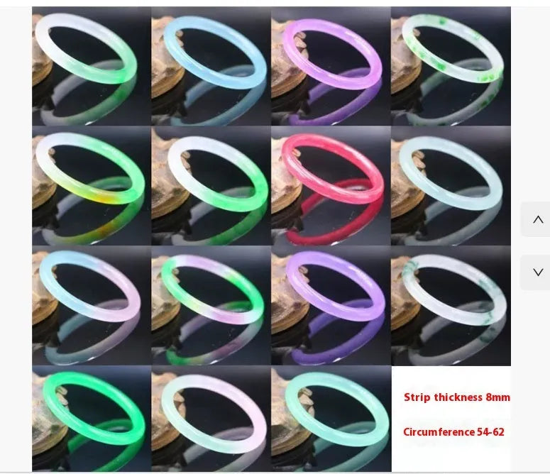 Jade bracelet with floating flower design and auspicious cloud patterns in ice-like emerald finish