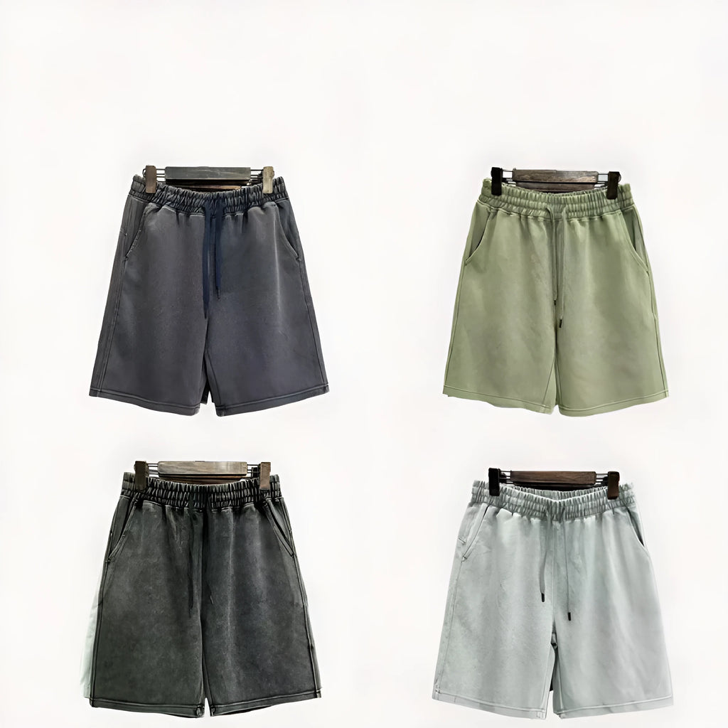 Men's straight-leg cotton casual shorts in distressed navy blue colour showing loose fit and fifth-pants length