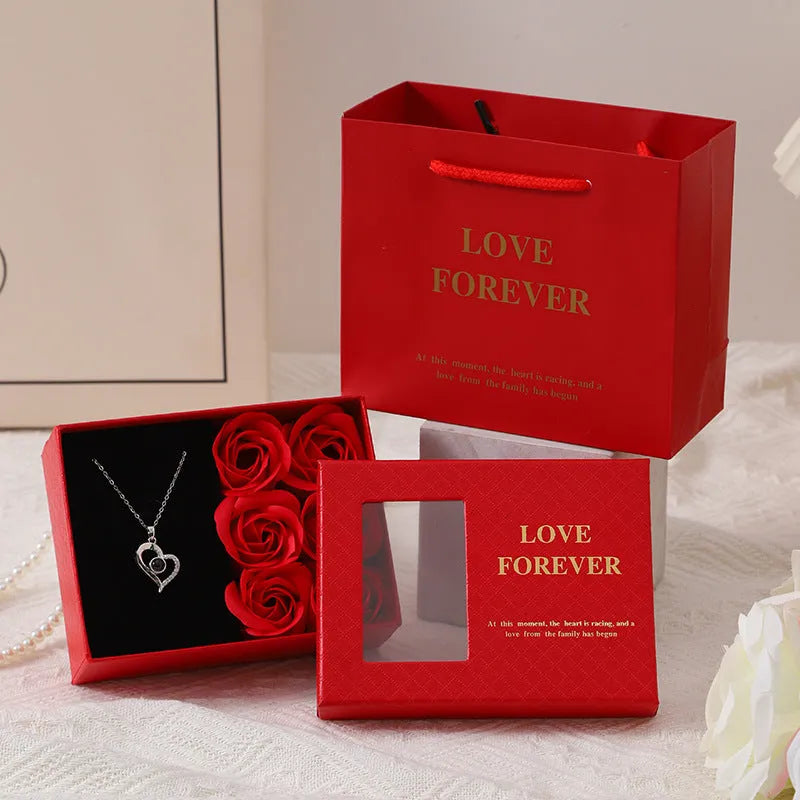 Red Korean-style soap flower gift set with six flowers in a box, handbag, and measuring 12.5 by 8.5 by 4.5 cm.