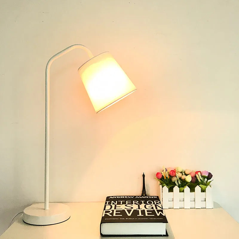 Nordic style desk lamp with dimmer switch in white finish on wooden desk