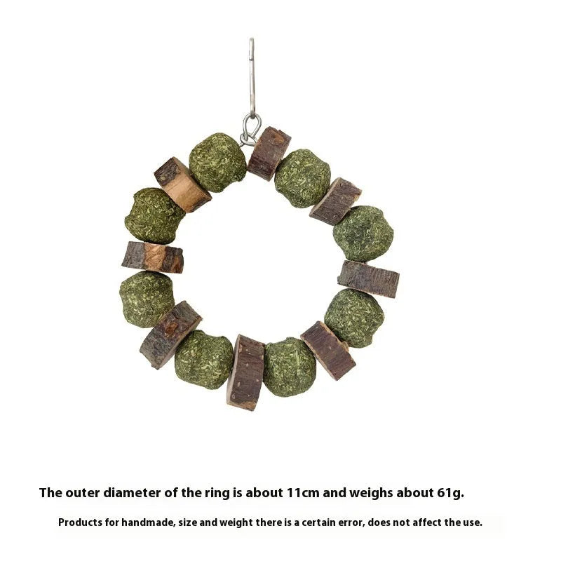 Decorative straw ball ring chew toy made from applewood for hamsters and small pets.