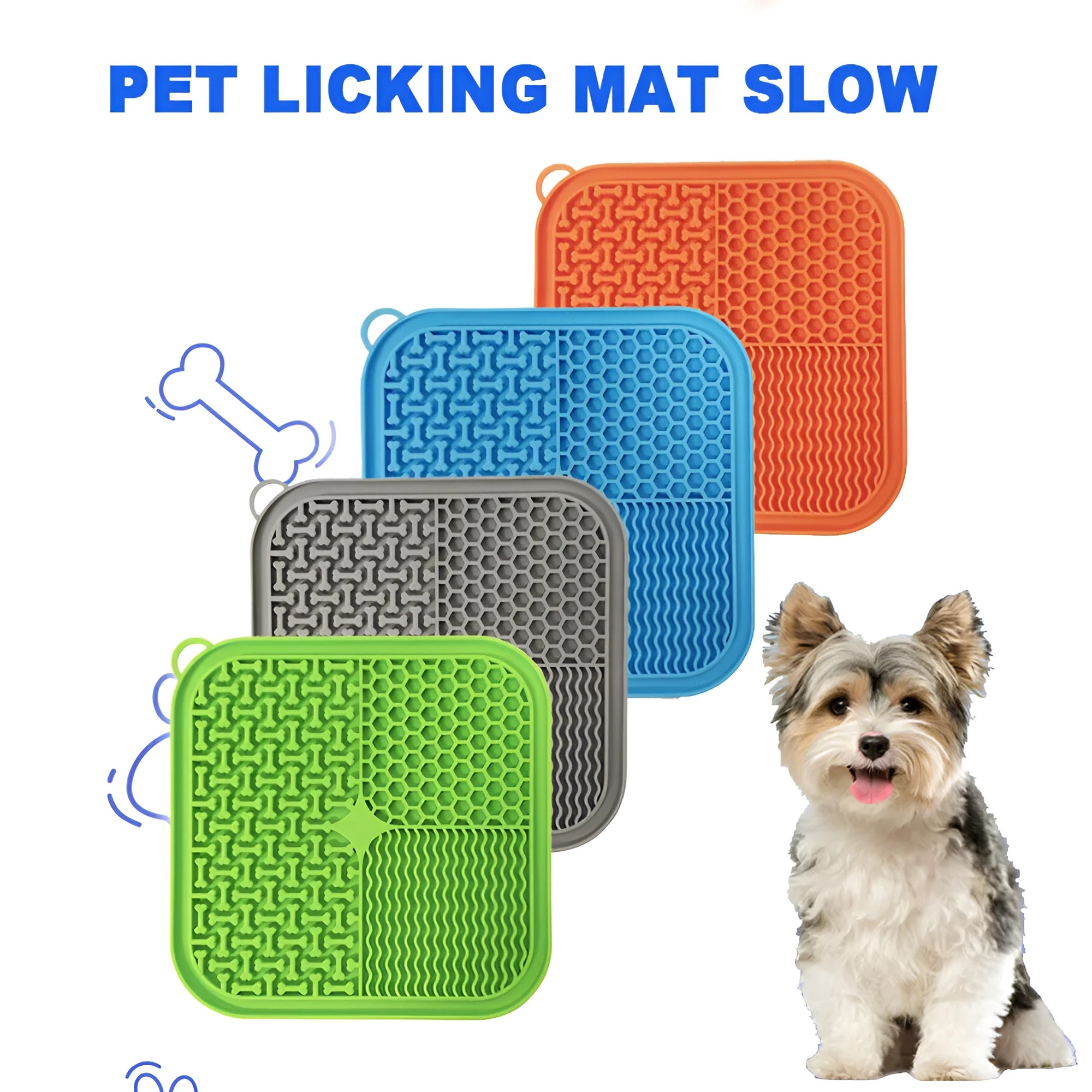 Orange, grey, blue, and green silicone dog licking mat with suction cups on a smooth surface.