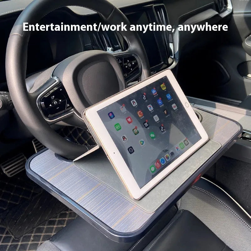 Foldable black ABS plastic car steering wheel tray with a large flat surface, shown unfolded on a steering wheel.