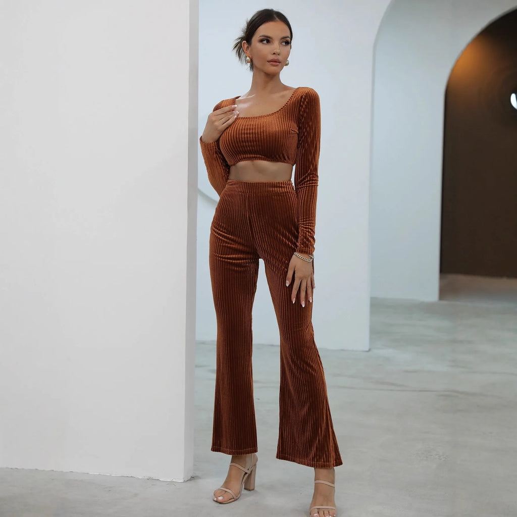 Caramel coloured long sleeve sweater and trousers casual set laid flat.