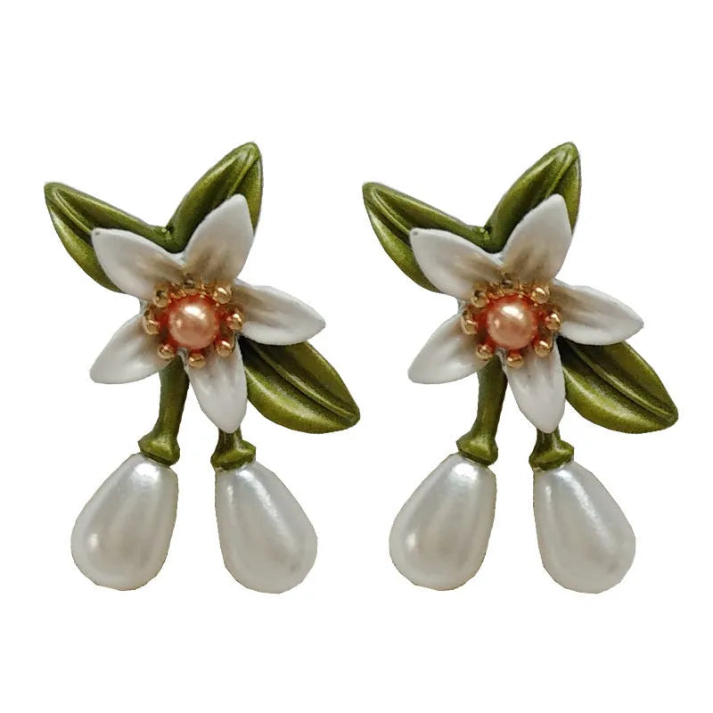 Alloy camellia flower earrings with sterling silver needle detailing for women
