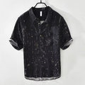 Men's loose fit polo shirt in black or white with short sleeves and cardigan style