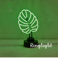 Minimalist bamboo-shaped white and green desktop lamp with USB cable in two size options.