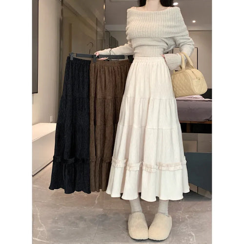 Corduroy A-line midi skirt with elastic waistband in milky white colour showing Korean style design