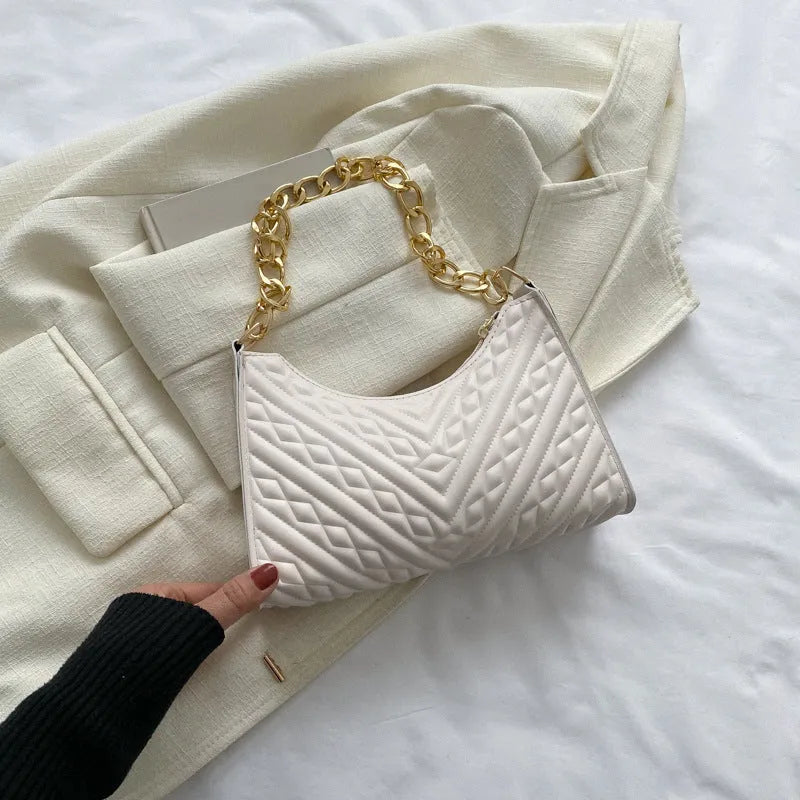 Soft PU leather pleated chain baguette shoulder bag in a vertical square shape, shown in brown colour.