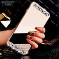 Gold rhinestone decorative silicone back cover case on a Huawei P30 Pro mobile phone.