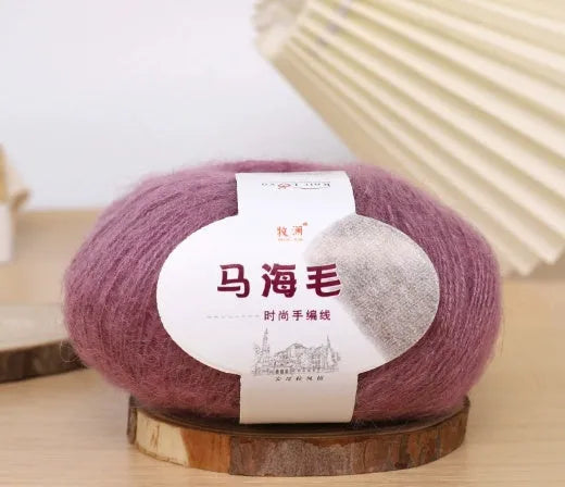 Mohair wool ball for DIY scarf knitting in assorted colours on white background